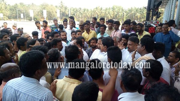 Toll collection which had begun at the  toll plaza set up by the Navayuga Infrastructure at Hejamady,  at midnight on Thursday  had to be  suspended  early  morning on  Friday 